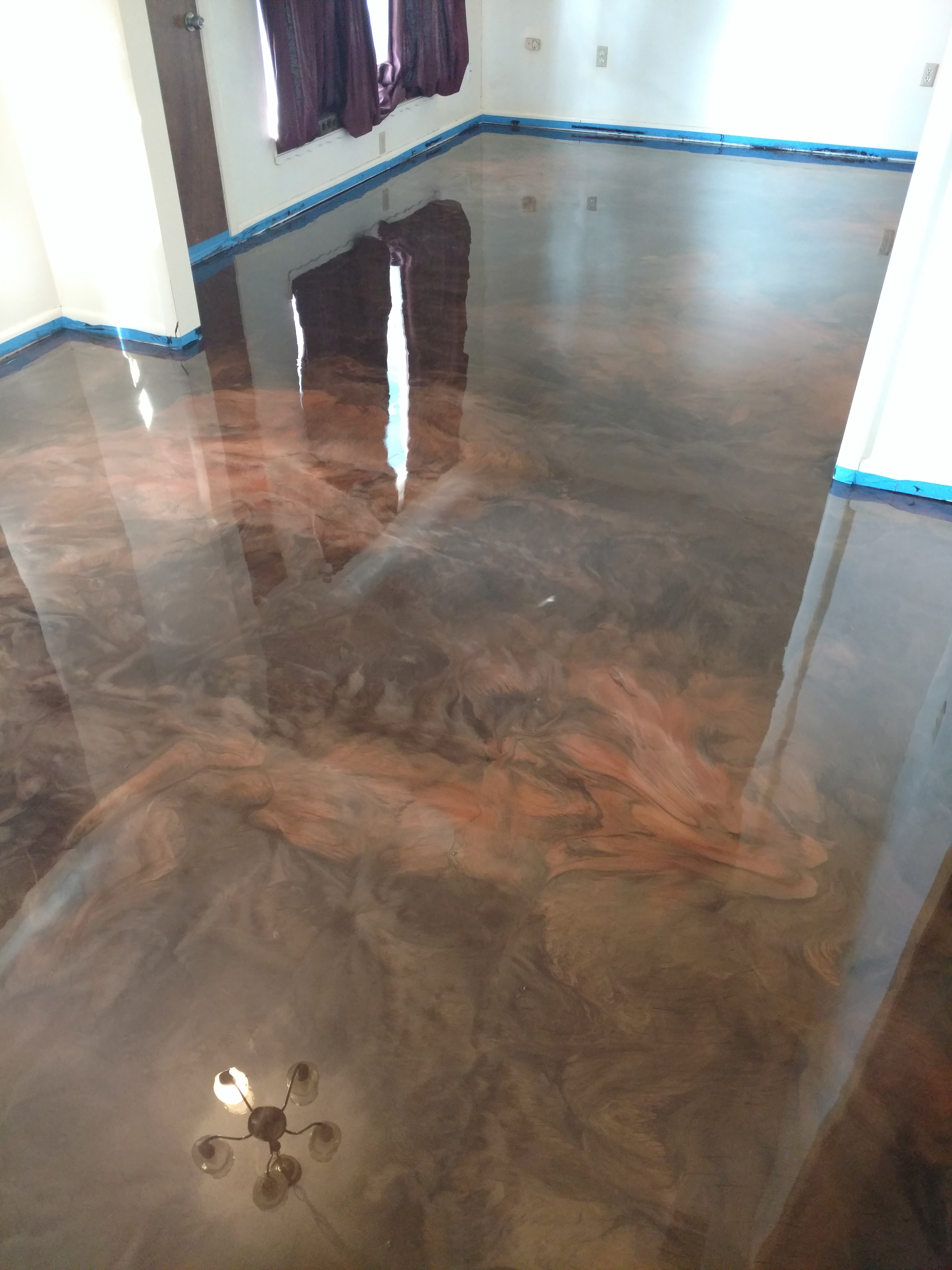 Metallic epoxy floor residential room Savannah GA